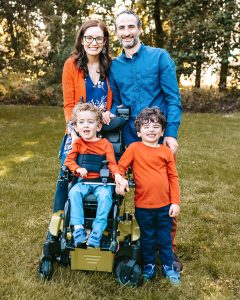 Dr. Burkman with her husband and twin sons.